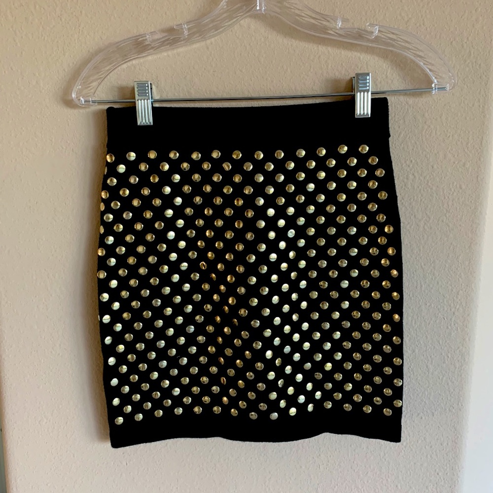 Black mini skirt with gold dots